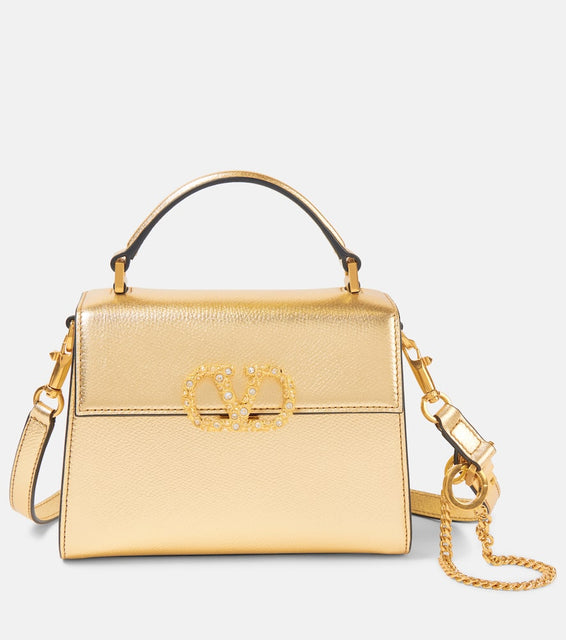 Valentino Garavani VSling Mini Swarovski√Ç¬Æ-embellished leather tote bag. Shop Valentino Garavani Top-Handle Bags for women now.