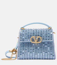 Valentino Garavani VSling Mini embellished tote bag. Shop Valentino Garavani Top-Handle Bags for women now.