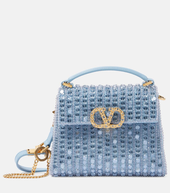 Valentino Garavani VSling Mini embellished tote bag. Shop Valentino Garavani Top-Handle Bags for women now.