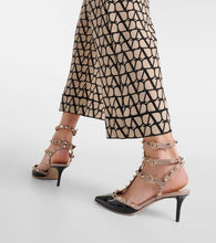 Valentino Garavani Valentino Garavani Rockstud patent leather pumps