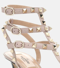 Valentino Garavani Valentino Garavani Rockstud patent leather pumps