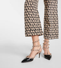 Valentino Garavani Valentino Garavani Rockstud patent leather pumps