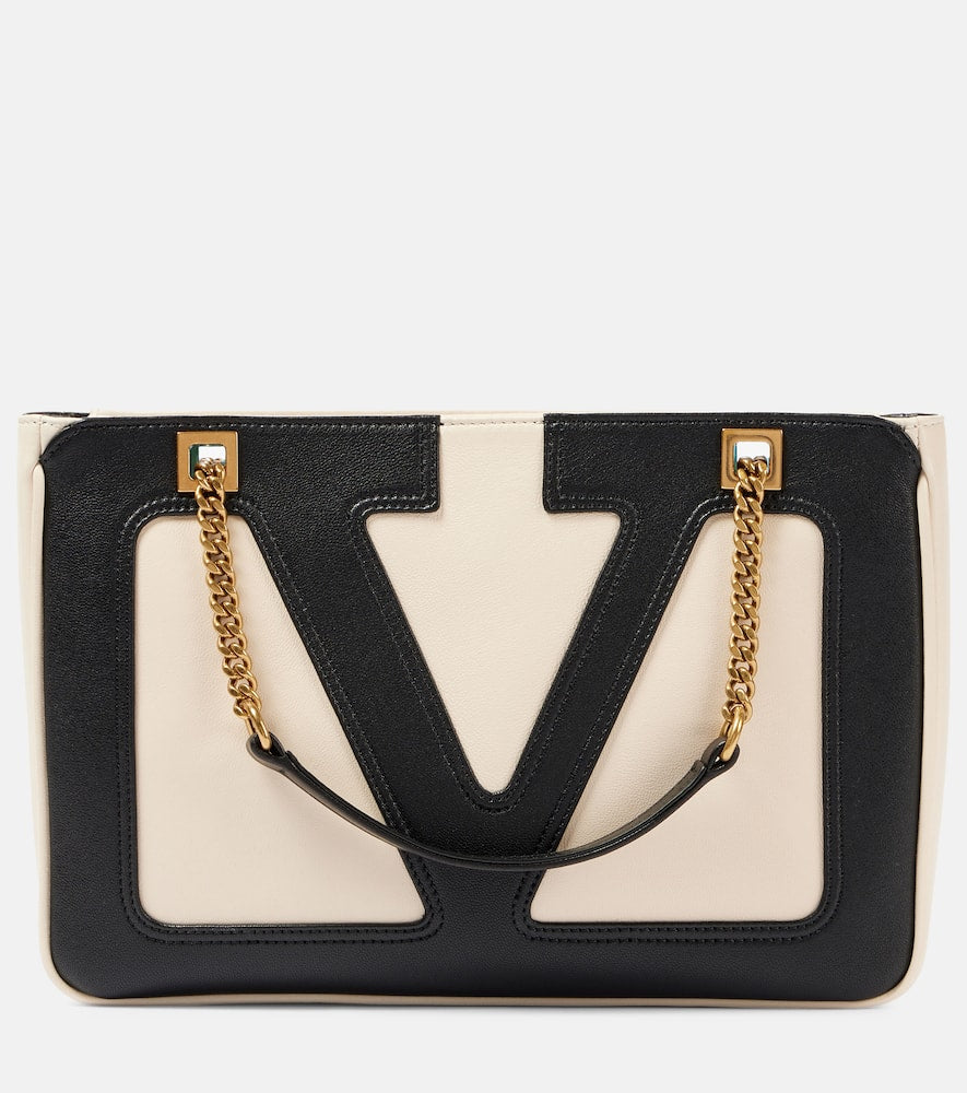 Valentino Garavani Viva Superstar Small leather tote bag. Shop Valentino Garavani Shoulder Bags for women now.