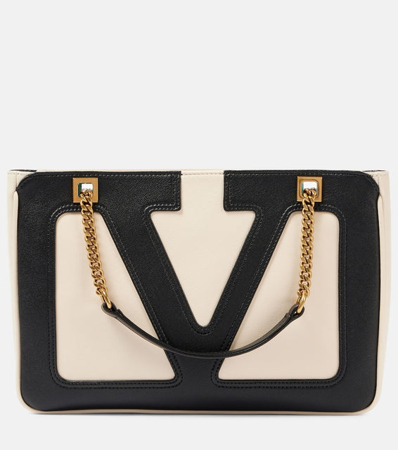 Valentino Garavani Viva Superstar Small leather tote bag. Shop Valentino Garavani Shoulder Bags for women now.