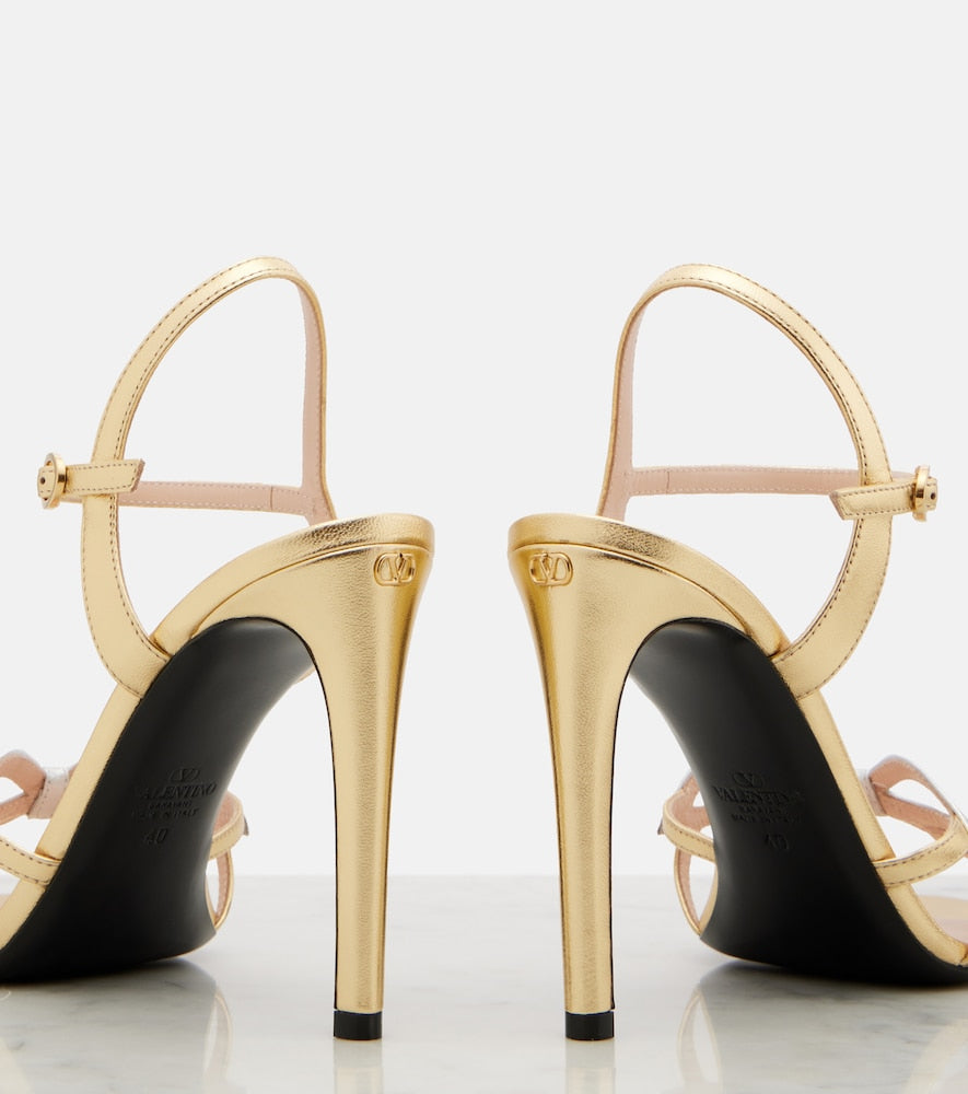 Valentino Garavani Bow metallic leather sandals in Gold - Heeled Sandals