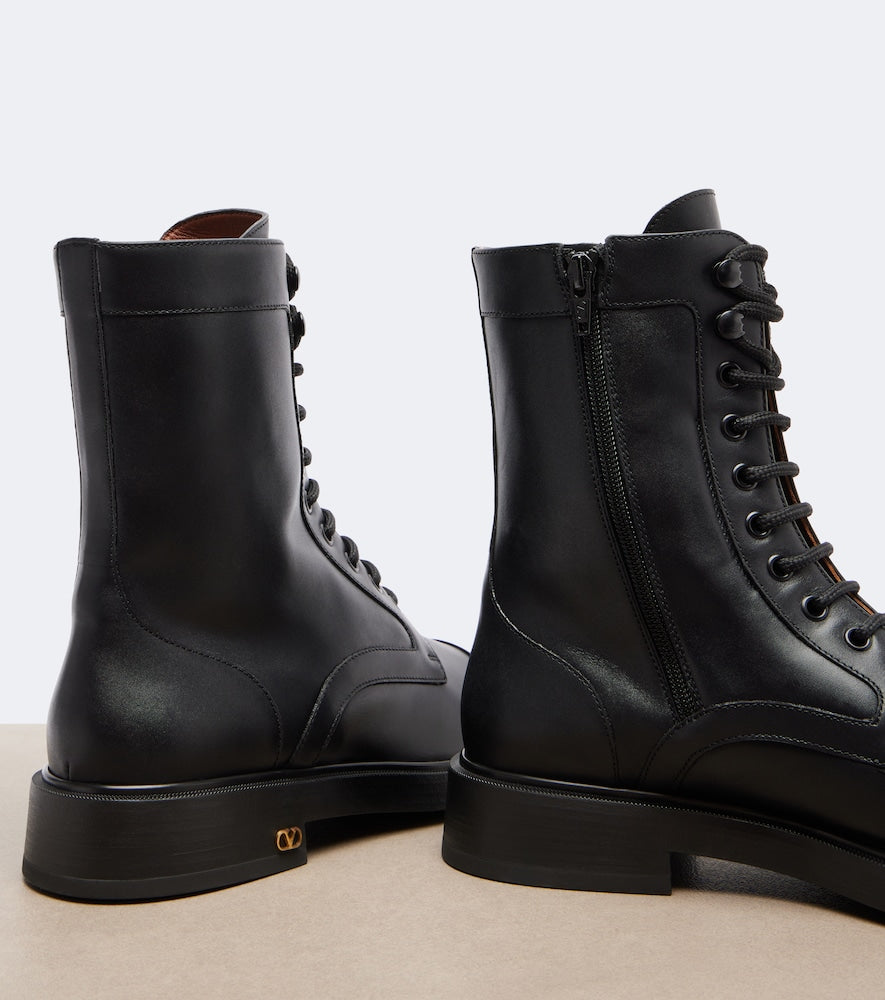 Black Valentino Garavani VLogo lace-up leather combat boots - Flat Boots