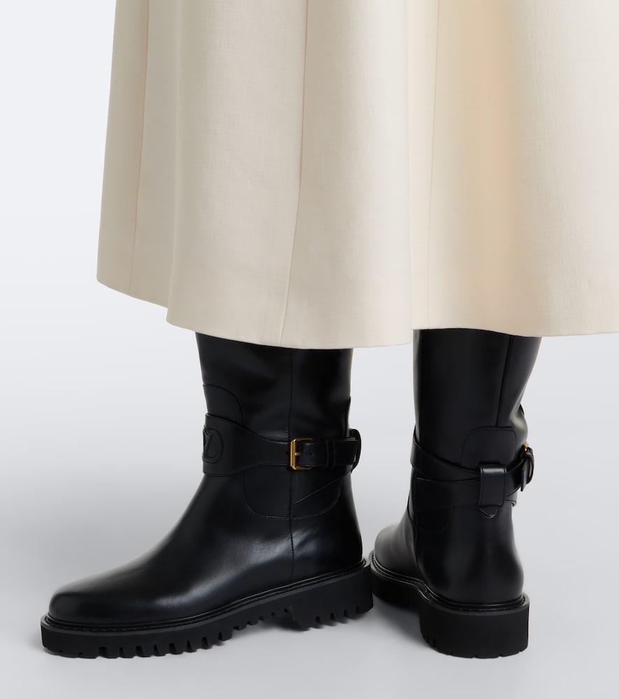Valentino Garavani VLogo leather knee-high boots in Black - Flat Boots
