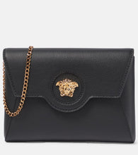 Versace La Medusa leather wallet on chain. Shop Versace Clutches for women now.