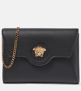 Versace La Medusa leather wallet on chain. Shop Versace Clutches for women now.