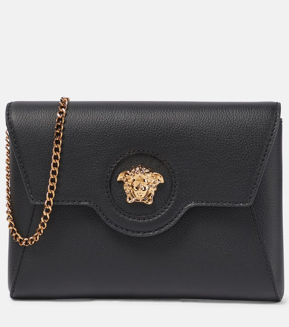 Versace La Medusa leather wallet on chain. Shop Versace Clutches for women now.