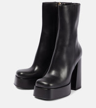 Versace Medusa Aevitas leather platform boots