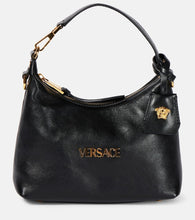 Versace Tag Small leather tote bag. Shop Versace Top-Handle Bags for women now.