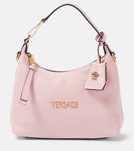 Versace Tag Small leather tote bag. Shop Versace Top-Handle Bags for women now.