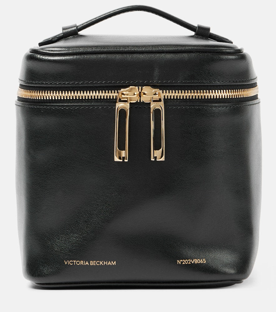 Victoria Beckham Vanity Cube leather shoulder bag. Shop Victoria Beckham Top-Handle Bags for women now.