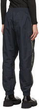 VETEMENTS Black Logo Tape Track Pants