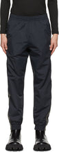 VETEMENTS Black Logo Tape Track Pants - Pantalon de piste de piste de bande logo noire - vetements 검은 로고 테이프 트랙 바지