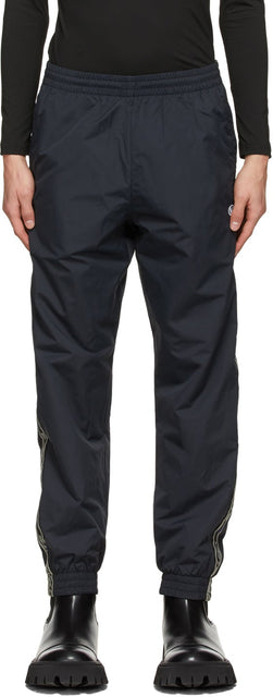 VETEMENTS Black Logo Tape Track Pants - Pantalon de piste de piste de bande logo noire - vetements 검은 로고 테이프 트랙 바지