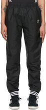 adidas x Human Made Black TyvekÂ® Track Pants - Pantalon Adidas X Human Fake Black Tyvek® Tyvek® - 아디다스 X 인간이 블랙 Tyvek® 트랙 바지를 만들었습니다