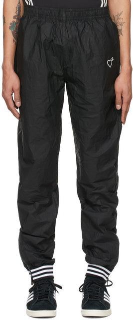 adidas x Human Made Black TyvekÂ® Track Pants - Pantalon Adidas X Human Fake Black Tyvek® Tyvek® - 아디다스 X 인간이 블랙 Tyvek® 트랙 바지를 만들었습니다